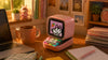 Back-to-school tech gadgets under 100 with Divoom Ditoo Pro retro pixel speaker on a cozy dorm desk