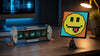 Divoom Times Gate dashboard beside a colorful Pixoo-Max pixel canvas