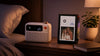 Divoom FlowToo and Times Frame together on a warm bedside table